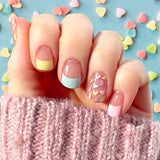 Pastel combo French tips with hearts accent on a clear background nail wrap nail design