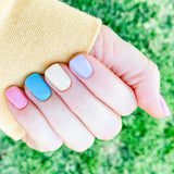 Mix of pastel solid colors including green, pink, peach, yellow, blue, purple nail wrap nail design