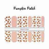 Pumpkins on white and orange stripes on white nail wrap nail design.  