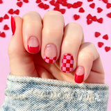 Combination of red and pink checkerboard French tips, solid red French tips and full solid red and full red and pink checkerboard nail wrap nail design.