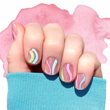 Sriped curves of pastel pink, blue and green on transparent nail wrap nail design.
