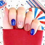 Blue solid, white stars on clear and red glitter stripes on clear nail wrap nail design