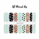 Black spotted starfish on mint, white daisies on black, black hearts on mint and black and mint leopard spots on pink nail wrap nail art design