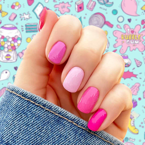 Light pink to dark pink different shades of solid pink combination nail wrap nail design. 