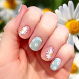Combo of white daisy on clear and small white daisies on light green nail wrap nail design
