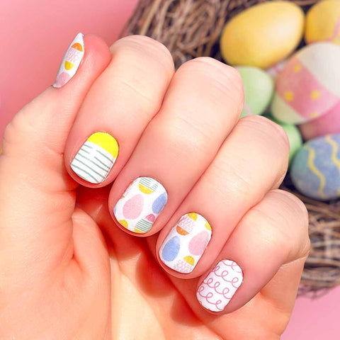 colored easter eggs with stripe and curly accent nail wraps