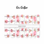 Pink and white combo with think black criss-cross lines and gold foil splotches nail wrap nail design