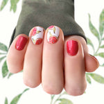 Grapefruit slices graphics with deep red accent nails nails nail wrap nail designs