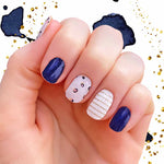 Combination of solid dark blue, gold glitter stripes on white and golden blue dots on light gray nail wrap nail designs
