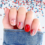 4th of July nail design wraps!  White stars on clear, red & white curves and solid blue and red accent nail wrap nail designs