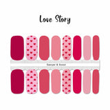 Solid shades of pink with a accent of dark pink hearts on a light pink background Valentine's Day nail wrap nail designs