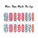 combo of of pink, orange and blue with leopard print and stars with one single eye nail wrap nail design