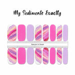 Shades of pink and purple sand layers with solid pink and purple accents nail wrap nail design
