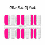 Split color of half bright pink and half white with little black feather hash marks nail wrap nail design