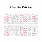 Small red and pink rainbows with black spots on white accents nail wrap nail design
