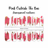 Pink airbrushed shapes with gold foil splotches on transparent nail wrap nail design.  