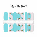 Full solid light blue in combination with light blue, off white and gold splotches accents nail wrap nail design.  