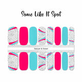 Combination of pink, blue and black spots on white nail wrap nail design.  
