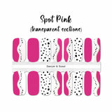 A combination of solid pink, black spots on white and a mix of pink curves and black spots on white curves on transparent sections nail wrap nail design.  