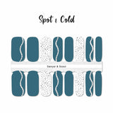 A combination of solid cobalt blue, black spots on white and white curved lines  nail wrap nail design.  