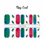 Combination of full green and blue watercolor pattern, full pink and red watercolor pattern and red and green popsicles on white accents nail wrap nail design.  