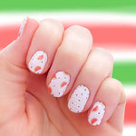 Watermelon slices on pink with black seed dots on pink accents nail wrap nail design.  