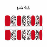 Solid red with pink and black leopard spots on white nail wrap nail design.  