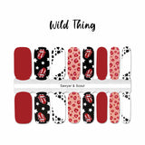 Combination of pink cheetah, black cow print on white, red rock & roll tongue and black with stars and solid red accents nail wrap nail design.  