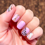 Combination of cheetah print on pink, shades of brown and cheetah curves and stars on pink and solid pink nail wrap nail design.  